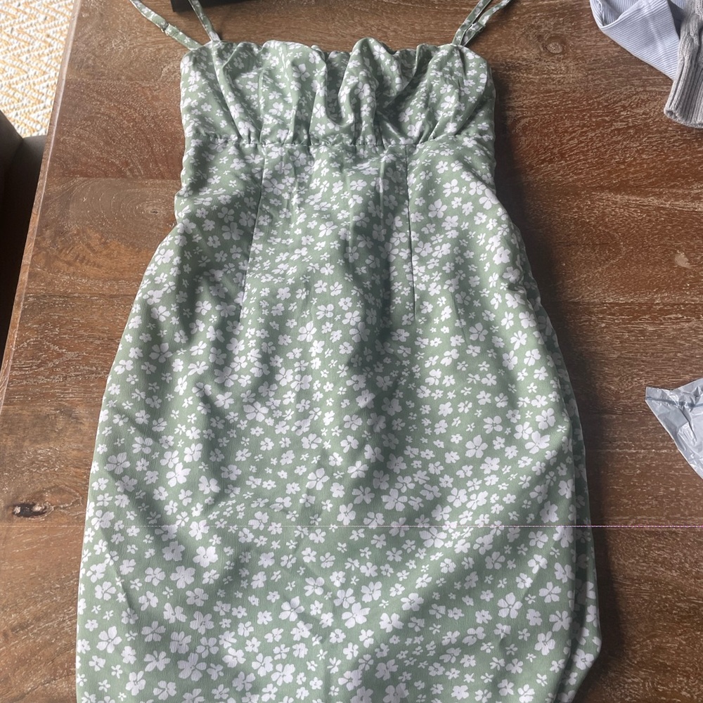 green flowered dress